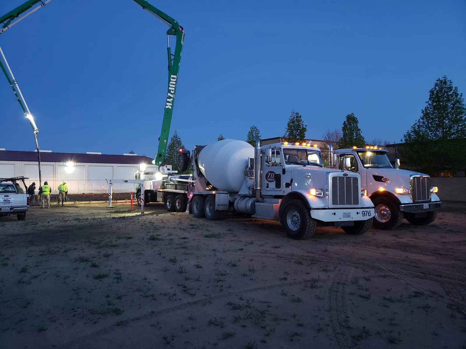 Concrete trucks and crews pouring the slab at Big Storage in Lodi, CA, during construction