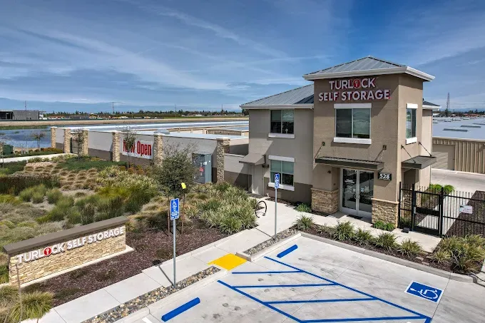 Turlock Self Storage's two-story office and monument sign in Turlock, CA