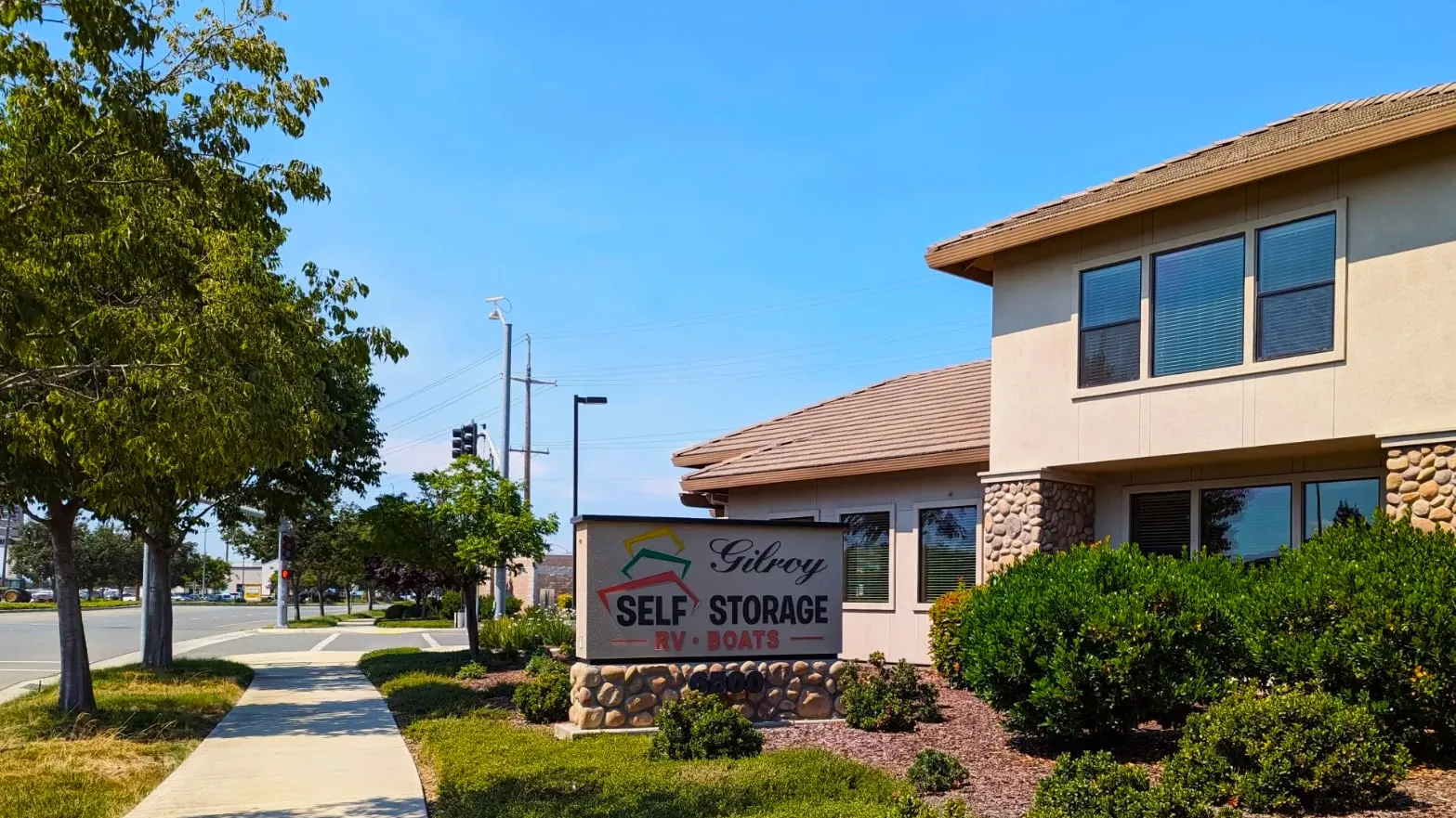 Gilroy Self Storage's monument sign in Gilroy, CA, advertising RV and boat parking