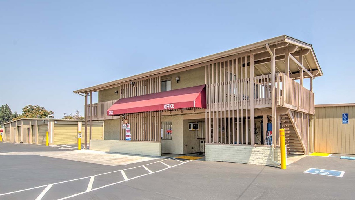 The two-story office with its red awning at Willow Glen Storage in San Jose, CA